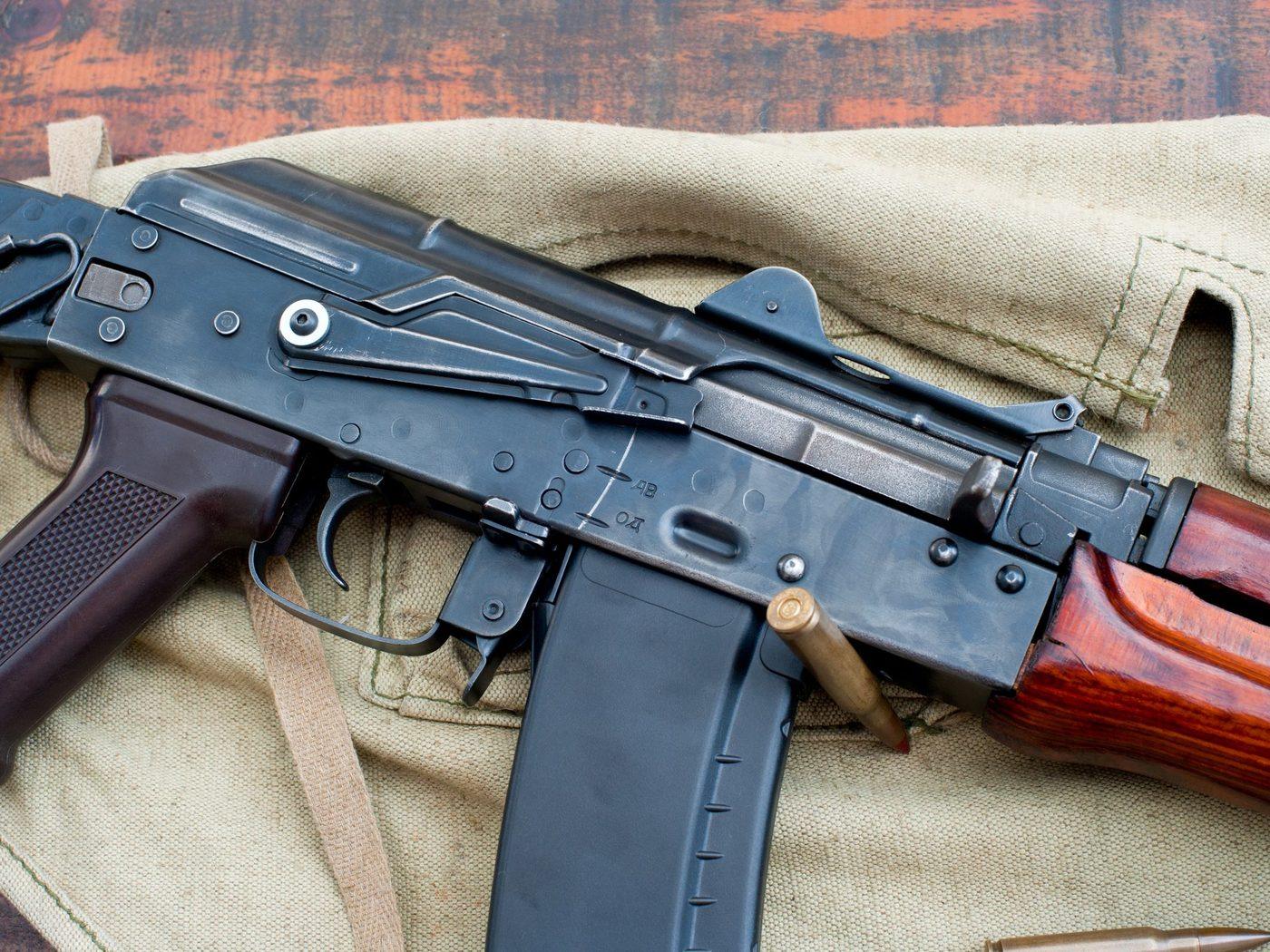 A rifle host set up on a bench, ready for suppressor fitment